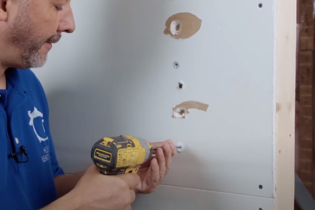 fixing screw pops in drywall